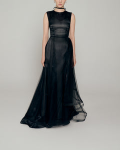 Black organza gown with tulle drape overlay and asymmetrical hem