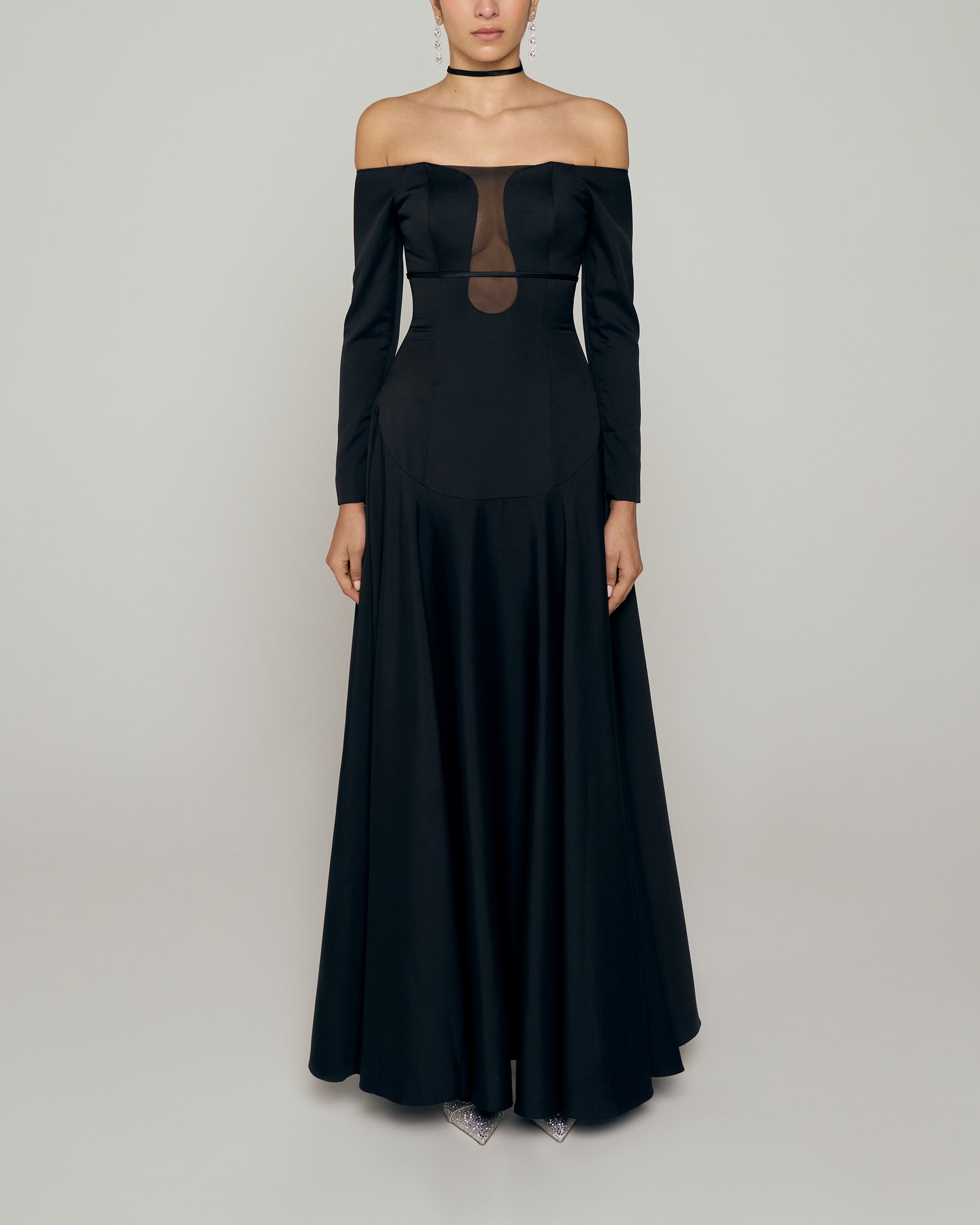 Black crepe A line off shoulder gown with plunge neckline and belt