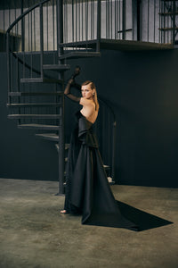 Strapless velvet dress with statement train and tulle glove